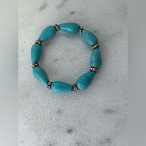 Stretchy Turquoise Stone and Silver Tone Beaded Bracelet..